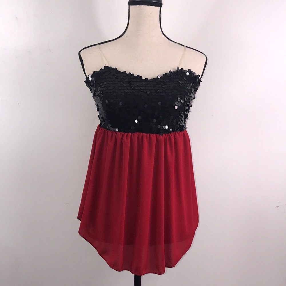 Black sequined and red blouse
